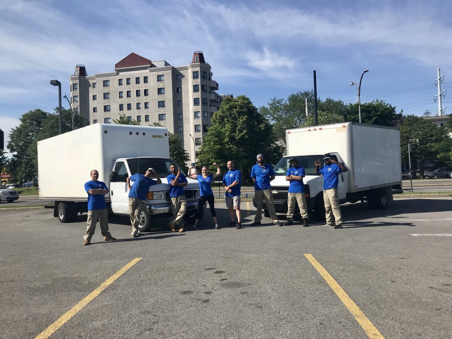 People standing in front of trucks